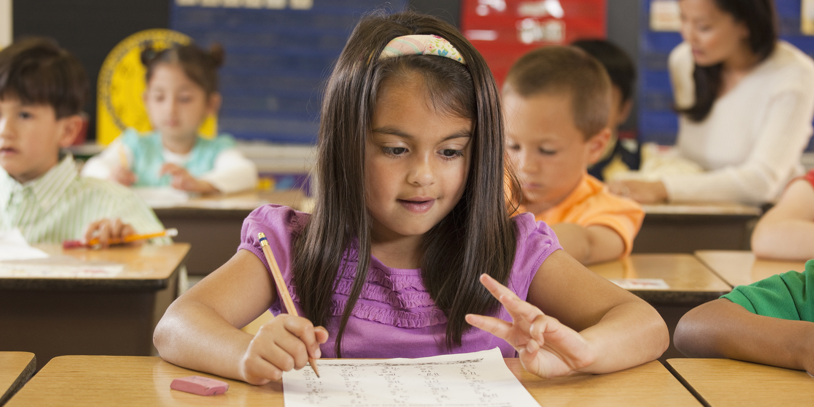 In a Maryland elementary school, a staff member lights a path for kids and their families 